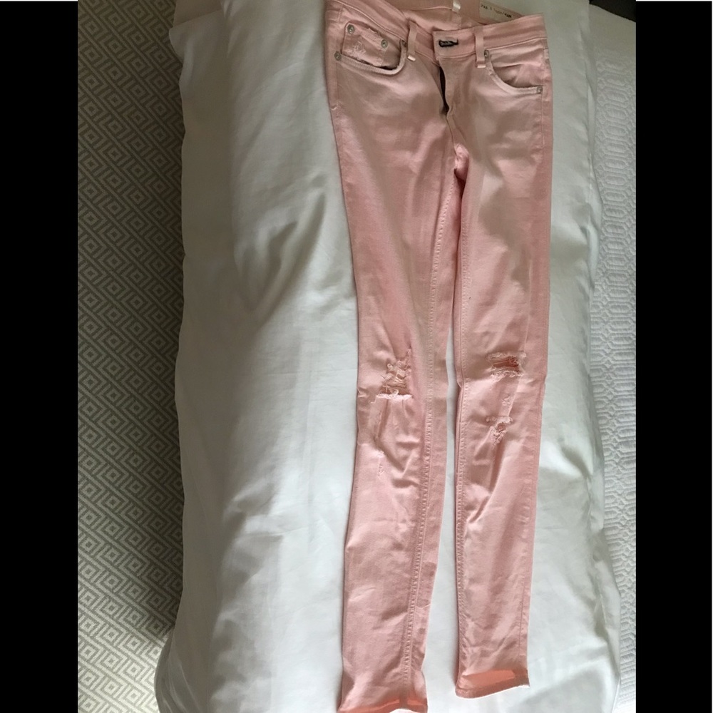 Baby pink rag and bone skinny jeans with holes